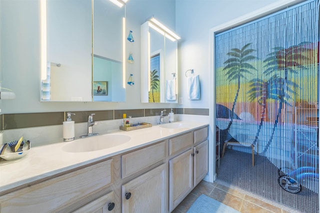 bathroom featuring tile patterned floors and vanity