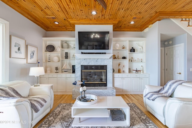 841 S County Road 13, Saint Augustine, FL 32092 - living room featuring light hardwood / wood-style flooring, wooden ceiling, and a premium fireplace