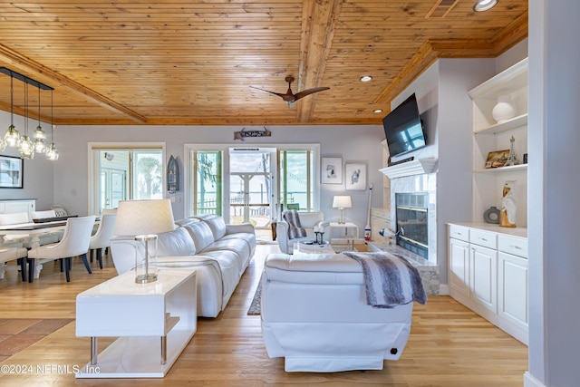 841 S County Road 13, Saint Augustine, FL 32092 - living room featuring beamed ceiling, light hardwood / wood-style floors, ceiling fan, and wood ceiling