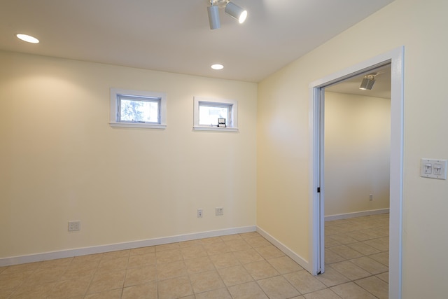 basement with light tile patterned floors