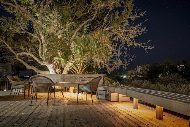 view of deck at twilight