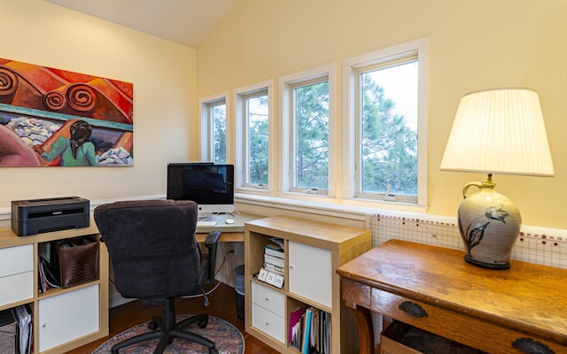 office area with lofted ceiling and dark hardwood / wood-style floors