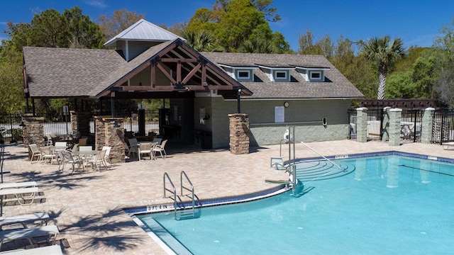 view of swimming pool with a gazebo and a patio