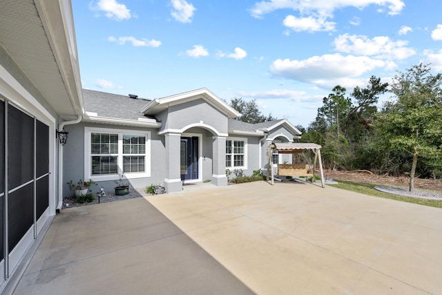 exterior space featuring a pergola and a patio