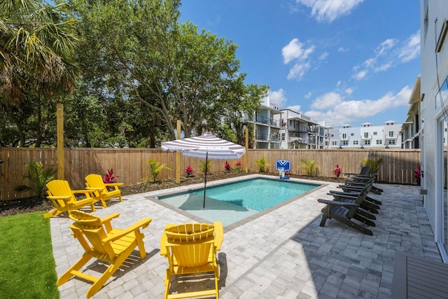 view of pool featuring a patio area