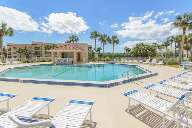 view of pool featuring a patio