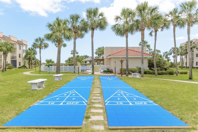 view of community featuring a yard