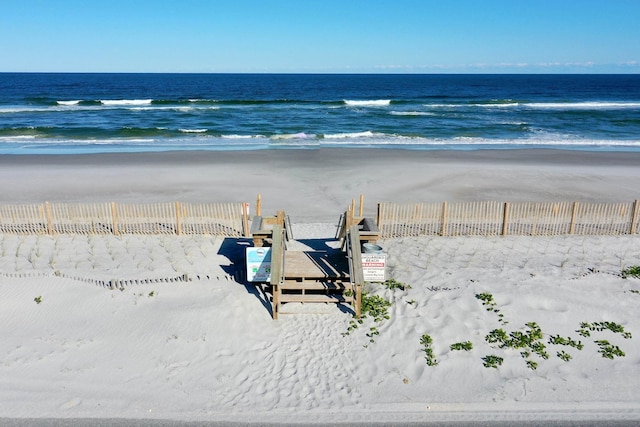 view of water feature with a beach view