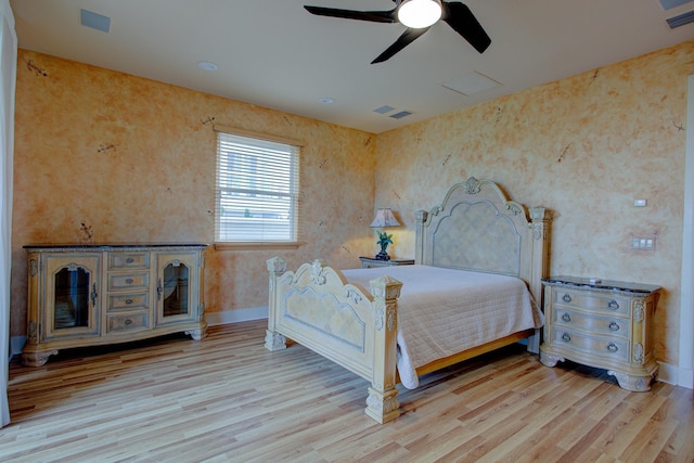 4 Oceanside Dr, Saint Augustine Beach, FL 32080 - bedroom with light wood-type flooring, wallpapered walls, and ceiling fan