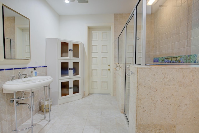4 Oceanside Dr, Saint Augustine Beach, FL 32080 - full bathroom with tile patterned flooring, a stall shower, tile walls, and recessed lighting