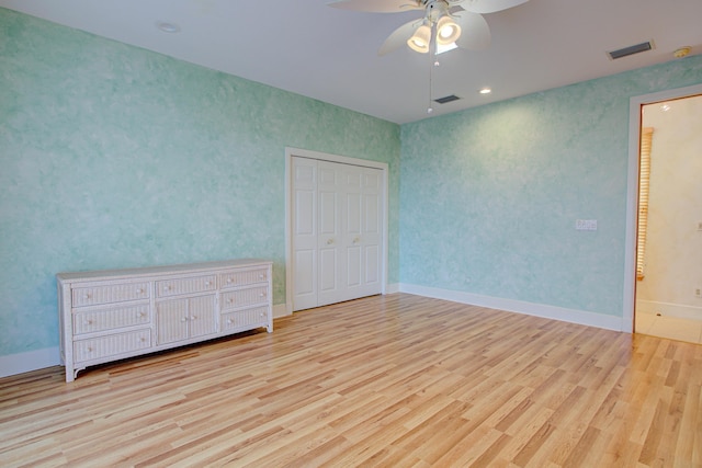 4 Oceanside Dr, Saint Augustine Beach, FL 32080 - unfurnished bedroom with wood finished floors, a ceiling fan, and a closet