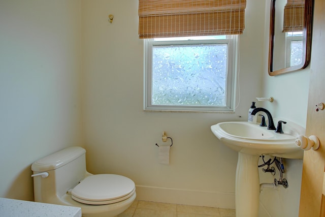4 Oceanside Dr, Saint Augustine Beach, FL 32080 - bathroom with toilet and tile patterned flooring