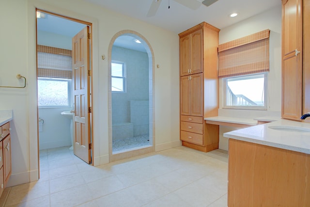 4 Oceanside Dr, Saint Augustine Beach, FL 32080 - bathroom featuring vanity, a tile shower, a ceiling fan, tile patterned flooring, and recessed lighting