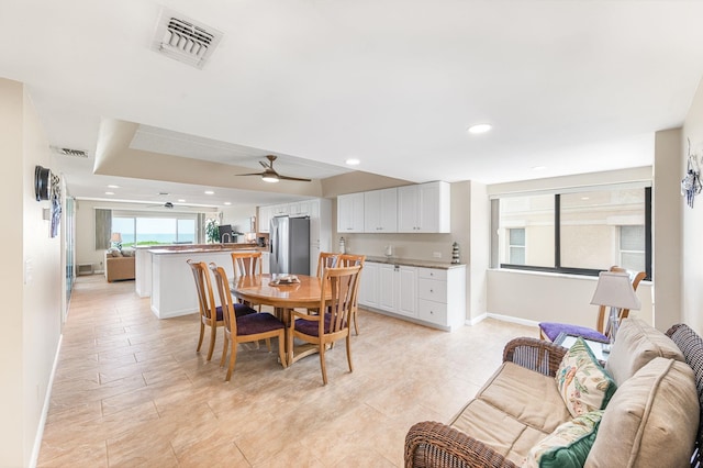 7780 S A1A Unit 101, Saint Augustine, FL 32080 - dining space with ceiling fan and recessed lighting