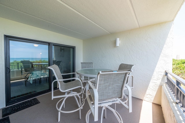 7780 S A1A Unit 101, Saint Augustine, FL 32080 - balcony with outdoor dining area