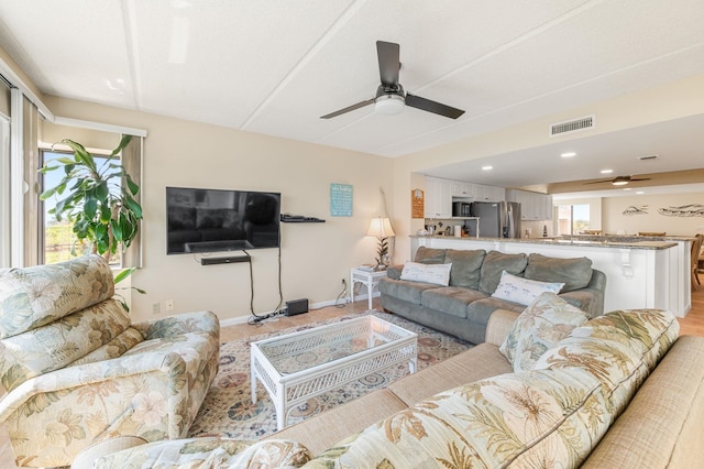 7780 S A1A Unit 101, Saint Augustine, FL 32080 - living area featuring ceiling fan