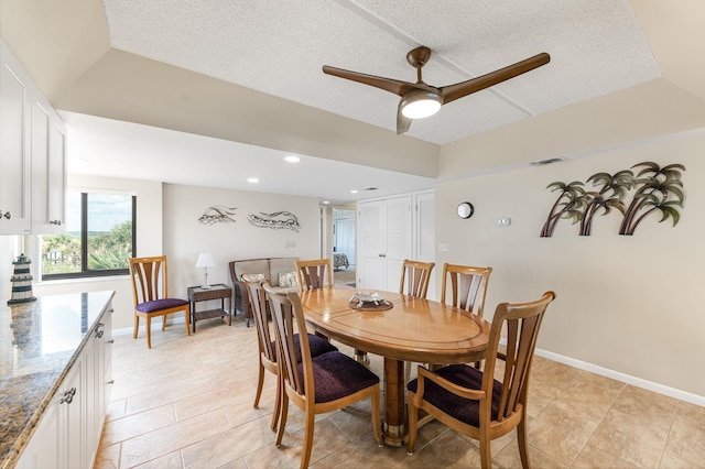 7780 S A1A Unit 101, Saint Augustine, FL 32080 - dining area featuring a ceiling fan, a textured ceiling, light tile patterned floors, and recessed lighting