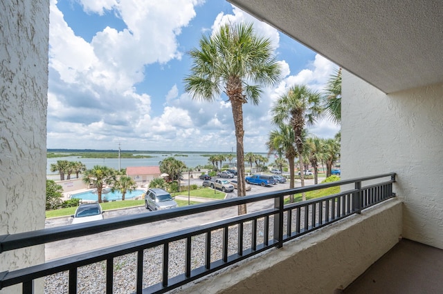7780 S A1A Unit 101, Saint Augustine, FL 32080 - balcony with a water view and view of pool