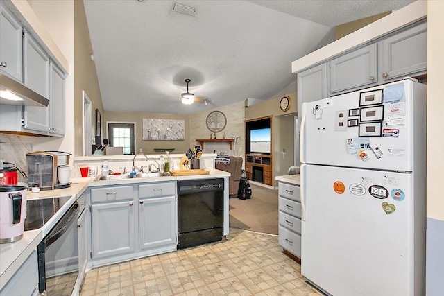 kitchen with sink, gray cabinets, black dishwasher, white fridge, and range