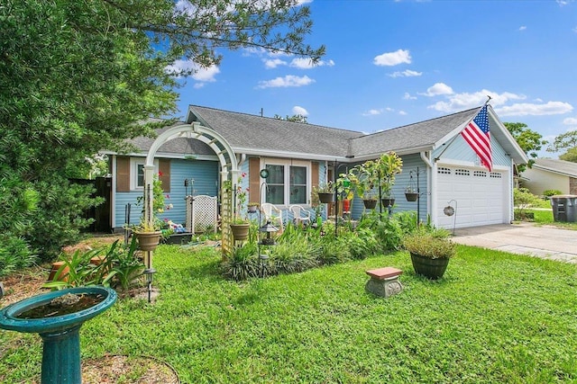 ranch-style home featuring a garage and a front yard