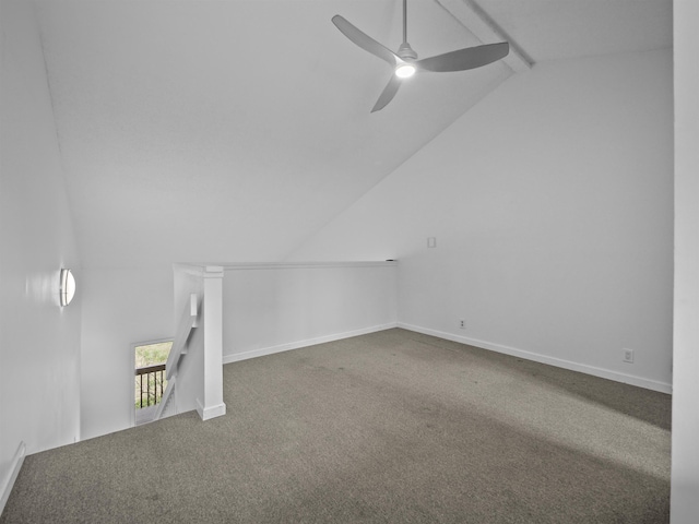 bonus room featuring vaulted ceiling, carpet floors, a ceiling fan, and baseboards