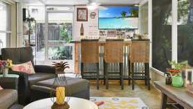 123 Whispering Oaks Cir, Saint Augustine, FL 32080 - sunroom / solarium with tile patterned floors