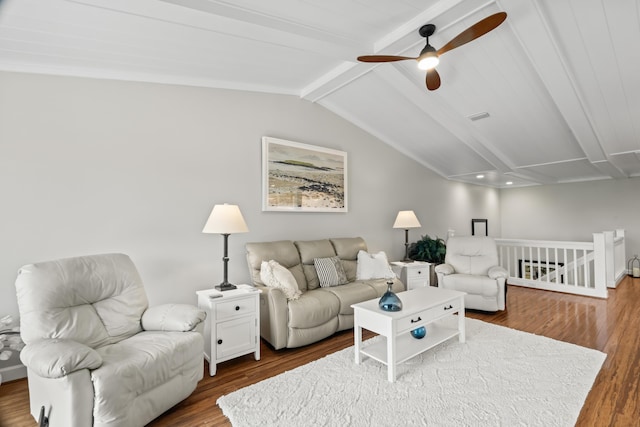 living room with vaulted ceiling with beams, ceiling fan, and hardwood / wood-style flooring