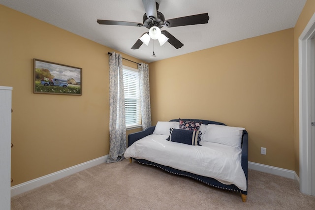 127 Adelanto Ave, Saint Augustine, FL 32092 - bedroom with carpet flooring, baseboards, and a ceiling fan