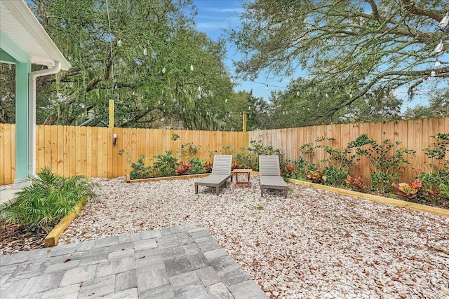 view of patio with a fenced backyard