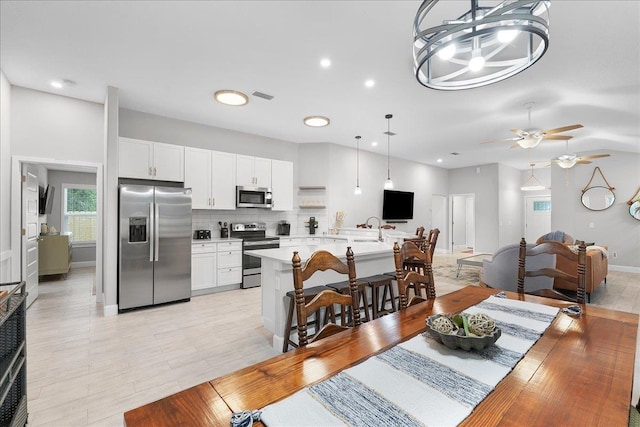 dining area with baseboards, visible vents, a ceiling fan, and recessed lighting