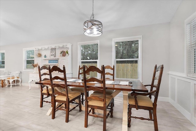 dining area featuring a chandelier