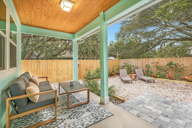 view of patio with a fenced backyard and an outdoor hangout area