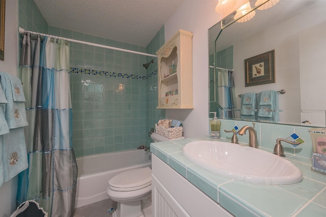 full bathroom featuring vanity, a textured ceiling, toilet, and shower / bath combo with shower curtain