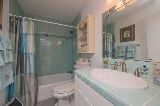 8130 A1A S H12, Saint Augustine, FL 32080 - full bath with vanity, shower / tub combo, a textured ceiling, and tile patterned flooring
