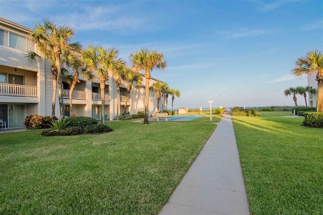 view of community with a lawn