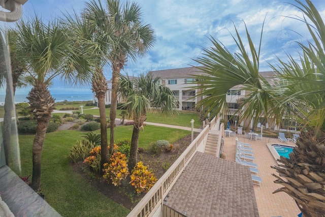8130 A1A S H12, Saint Augustine, FL 32080 - view of property's community featuring a yard, a water view, and a pool