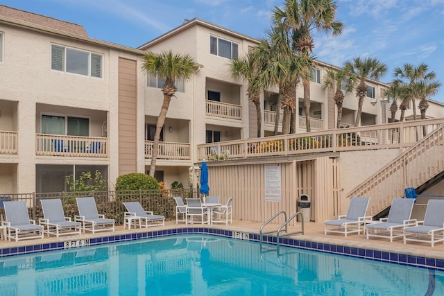 view of pool featuring a patio