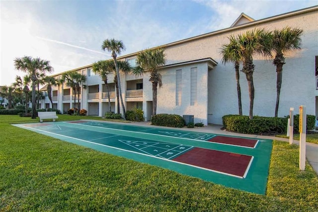 8130 A1A S H12, Saint Augustine, FL 32080 - view of home's community featuring a yard and shuffleboard