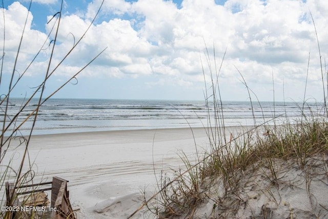 property view of water featuring a view of the beach