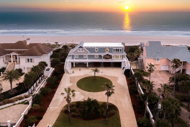 birds eye view of property featuring a residential view and a water view