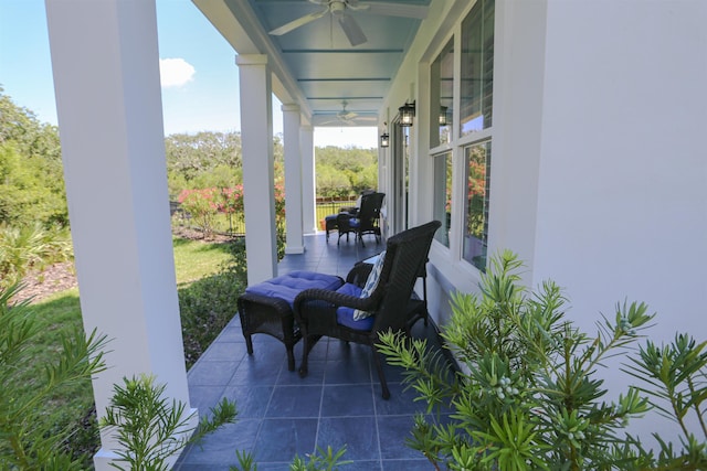 view of patio featuring ceiling fan and covered porch