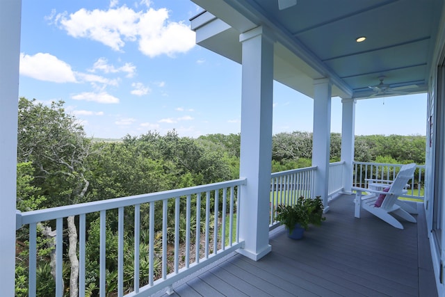 wooden deck with ceiling fan