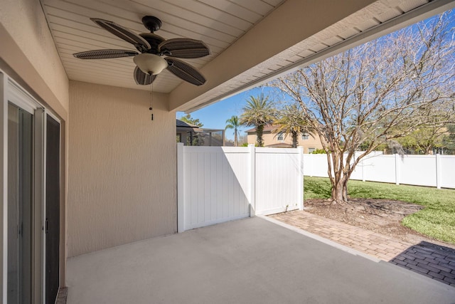 view of patio / terrace featuring a fenced backyard and a ceiling fan