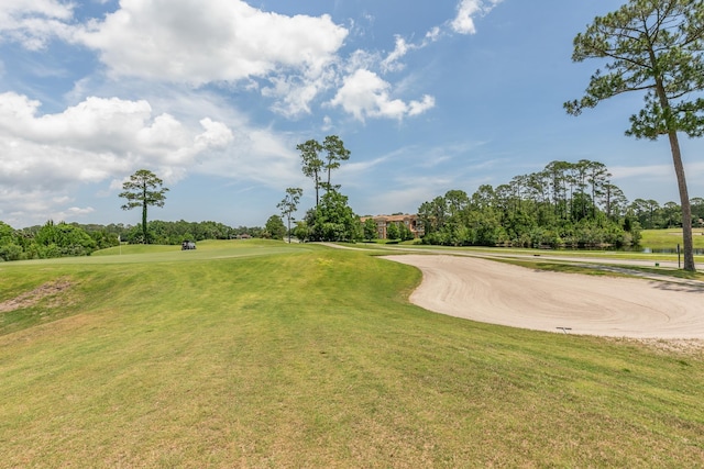 2077 W Lymington Way, Saint Augustine, FL 32084 - view of home's community featuring golf course view, view of wooded area, a lawn, and a water view