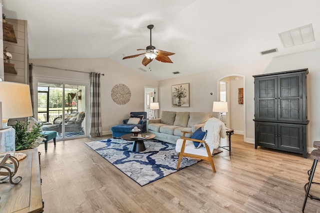 2077 W Lymington Way, Saint Augustine, FL 32084 - living area with arched walkways, ceiling fan, vaulted ceiling, light wood-type flooring, and baseboards