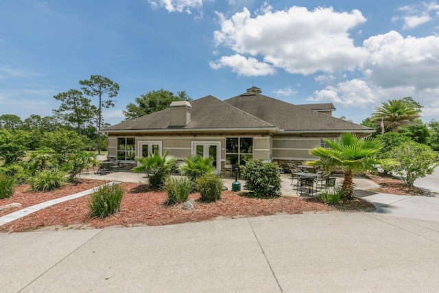 2077 W Lymington Way, Saint Augustine, FL 32084 - view of front of house with french doors and a patio