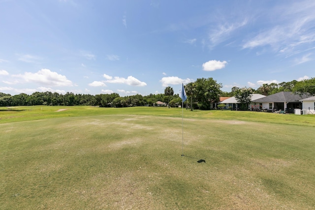 2077 W Lymington Way, Saint Augustine, FL 32084 - view of property's community featuring view of golf course, a yard, and view of wooded area