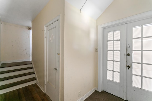 85 N Saint Augustine Blvd Unit 1, Saint Augustine, FL 32080 - doorway featuring baseboards, plenty of natural light, stairs, and lofted ceiling