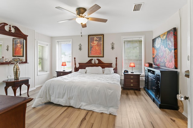 85 N Saint Augustine Blvd Unit 1, Saint Augustine, FL 32080 - bedroom featuring light wood finished floors, multiple windows, and ceiling fan