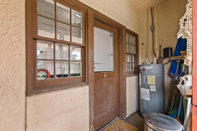 85 N Saint Augustine Blvd Unit 1, Saint Augustine, FL 32080 - utility room featuring electric water heater